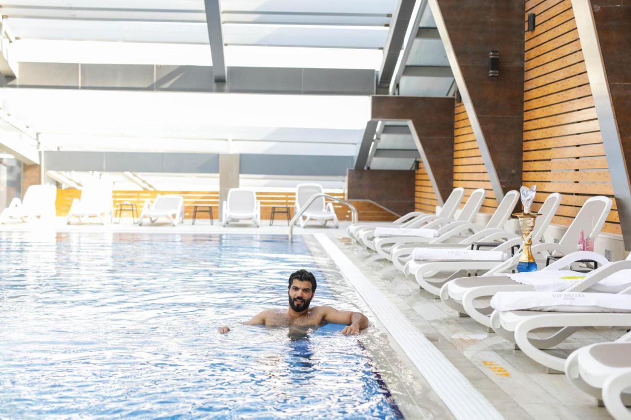 Vip Hotel Doha Qatar Exterior photo The rooftop pool at the hotel