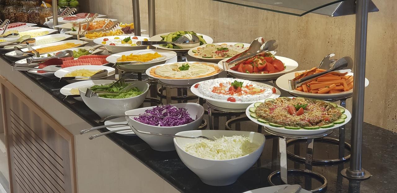 Vip Hotel Doha Qatar Exterior photo A salad bar